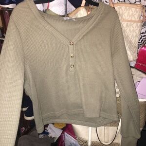 Olive Green Paper + Crane Top Size is X small but will fit a small / Medium